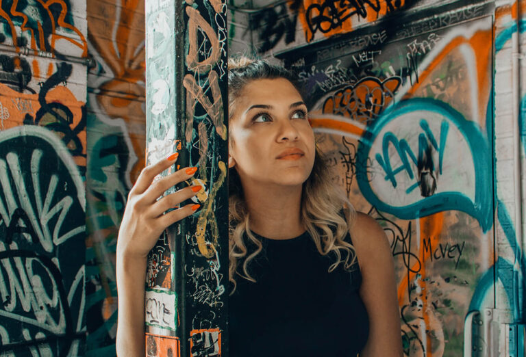 Creativity everywhere around woman with grafitti