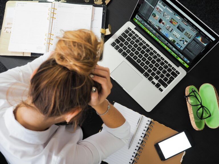 Woman stressed about all of her work and addictions